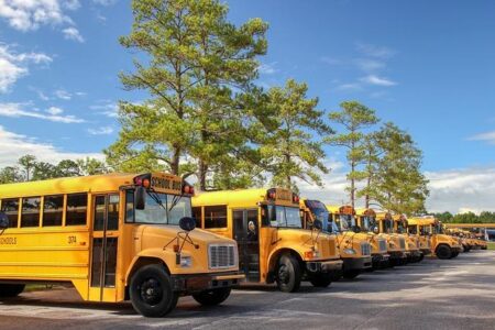 Migrants approached school buses, did not try to ‘hijack’ them | Fact check – USA Today