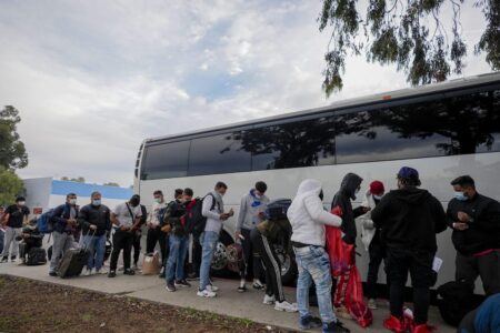 A woman met a group of migrants at a school bus stop. Then the story hit the internet – USA Today